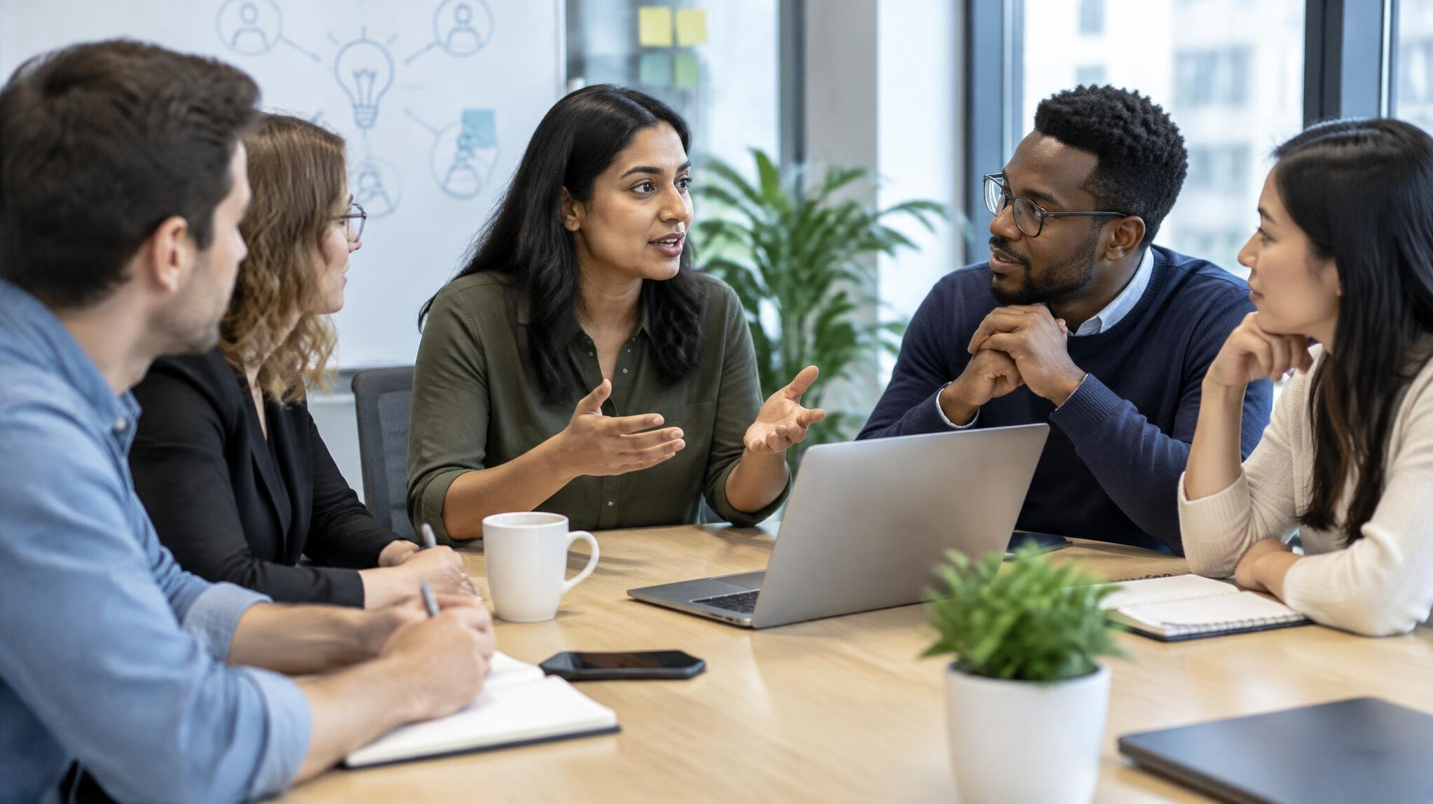 people discussing in office meeting